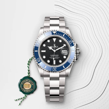 Silver and blue watch with a black dial on a white background - Nizam Watch House
