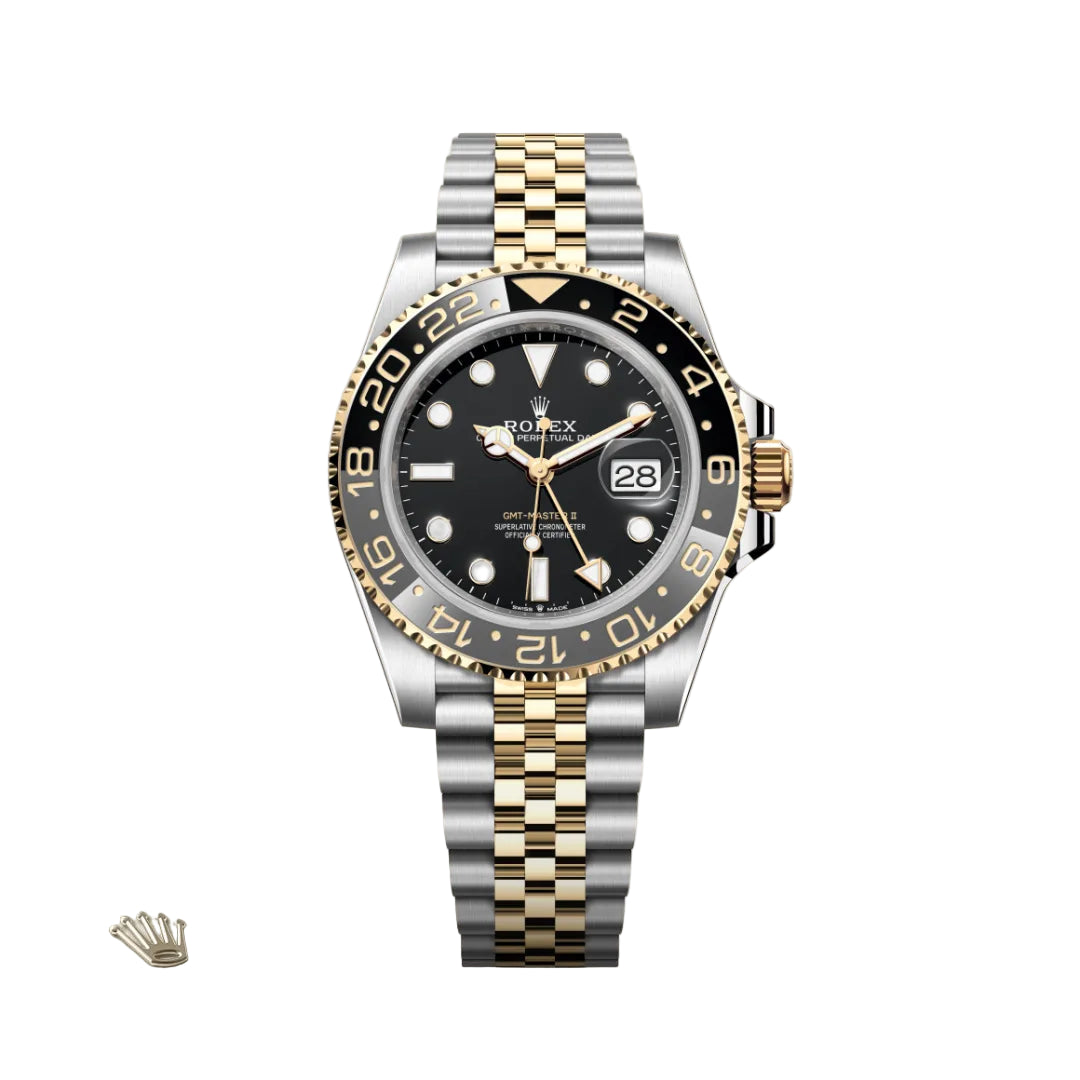Luxury watch with black dial and gold and silver band on a light beige background - ROLEX
