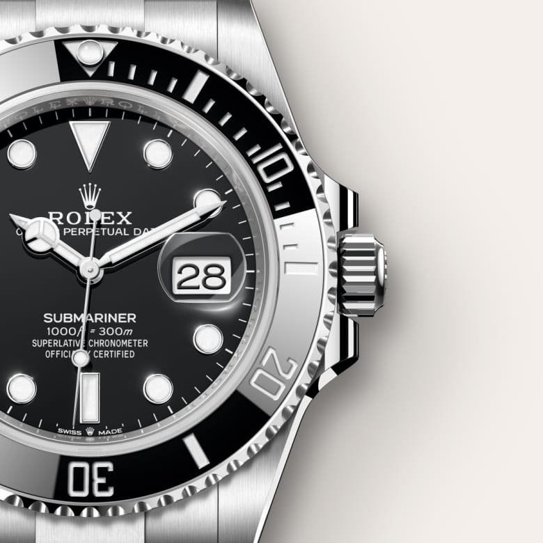 Close-up of a Rolex watch with black dial and silver case on a white  background  - Dreams Pakistan
